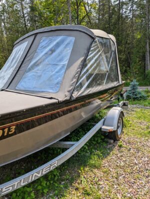 18' Canadian Crestliner boat, model 1850 Canadian SC with Profile 2000 Trailer & 2006 BRP Evinrude 60 outboard motor and more.