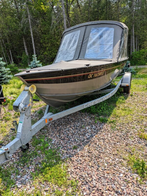 18' Canadian Crestliner boat, model 1850 Canadian SC with Profile 2000 Trailer & 2006 BRP Evinrude 60 outboard motor and more.