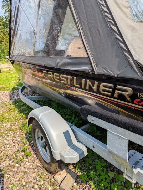 18' Canadian Crestliner boat, model 1850 Canadian SC with Profile 2000 Trailer & 2006 BRP Evinrude 60 outboard motor and more.