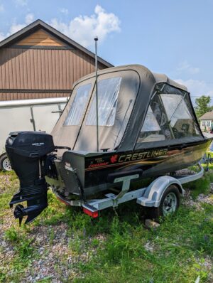 18' Canadian Crestliner boat, model 1850 Canadian SC with Profile 2000 Trailer & 2006 BRP Evinrude 60 outboard motor and more.