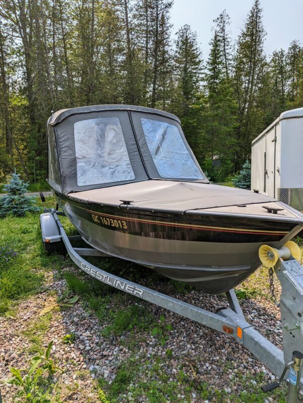 18' Canadian Crestliner boat, model 1850 Canadian SC with Profile 2000 Trailer & 2006 BRP Evinrude 60 outboard motor and more.